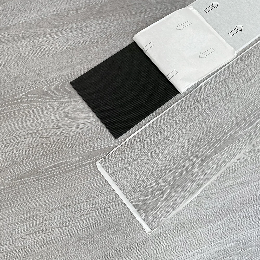Caja piso PVC - Autoadhesivo - CE-07 - Ceniza - Caja 5 m2 - 36 láminas por caja - 152*914*2 mm