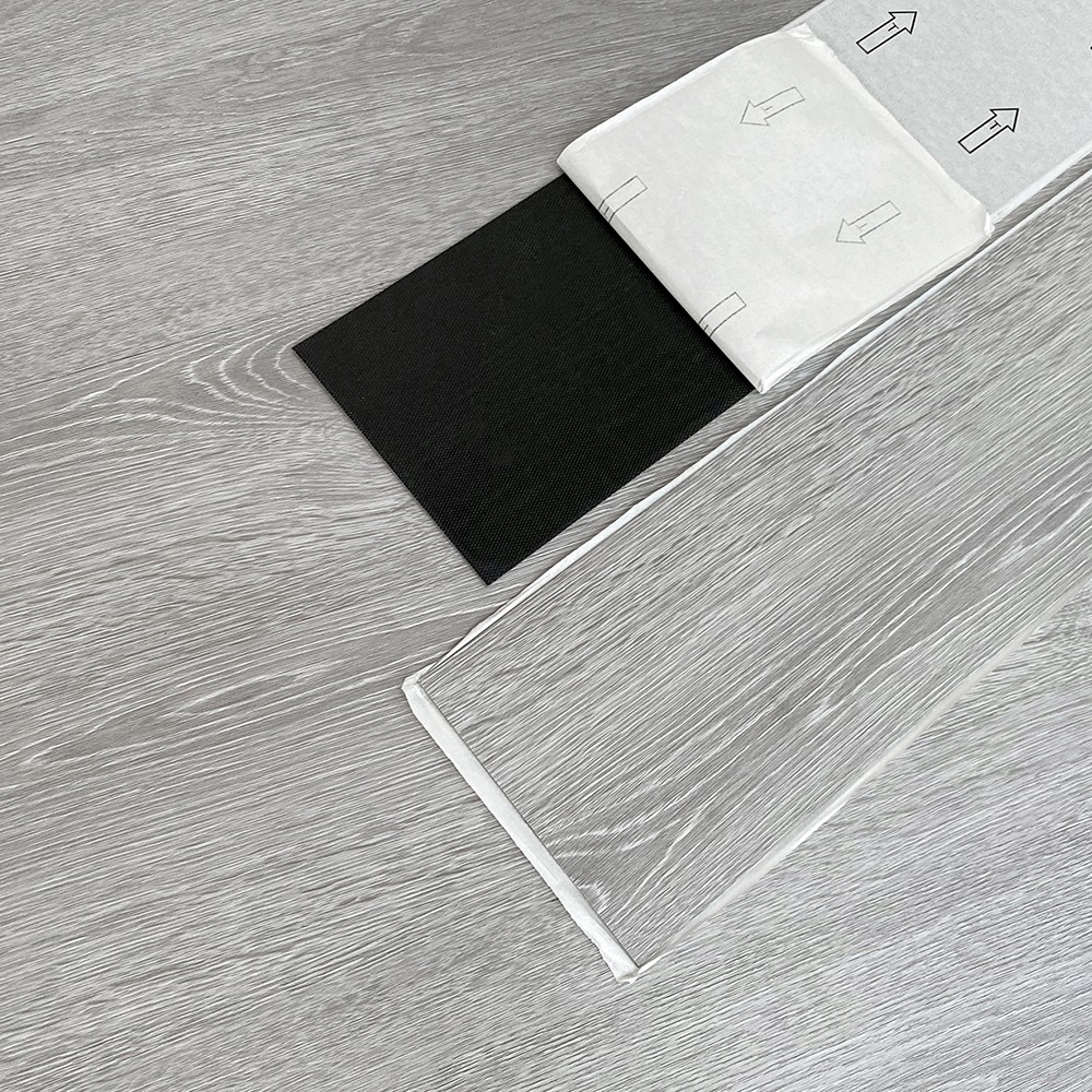 Caja piso PVC - Autoadhesivo - CE-07 - Ceniza - Caja 5 m2 - 36 láminas por caja - 152*914*2 mm